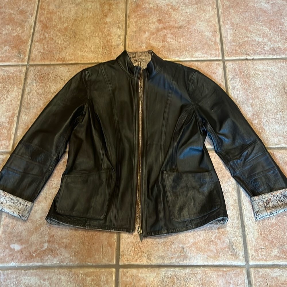 Chico’s all leather brown reversible coat. Size 1 (fits like a medium).